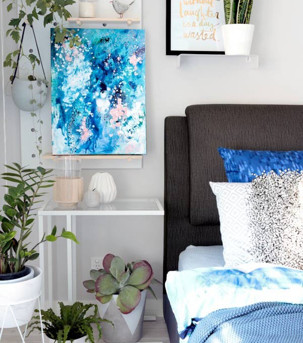 "When Snow Falls" original abstract artwork in blues by Australian artist Kate Fisher. Styled in master bedroom with adairs bedding, kmart pegboard and indoor plants.