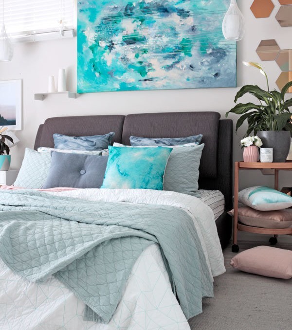 Contemporary bedroom in grey, sage and blue styled with adairs bedding and Kate Fisher original art "Halcyon"