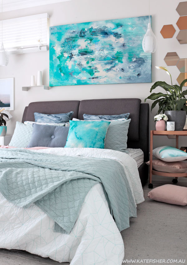 Contemporary bedroom in grey, sage and blue styled with adairs bedding and Kate Fisher original art "Halcyon"